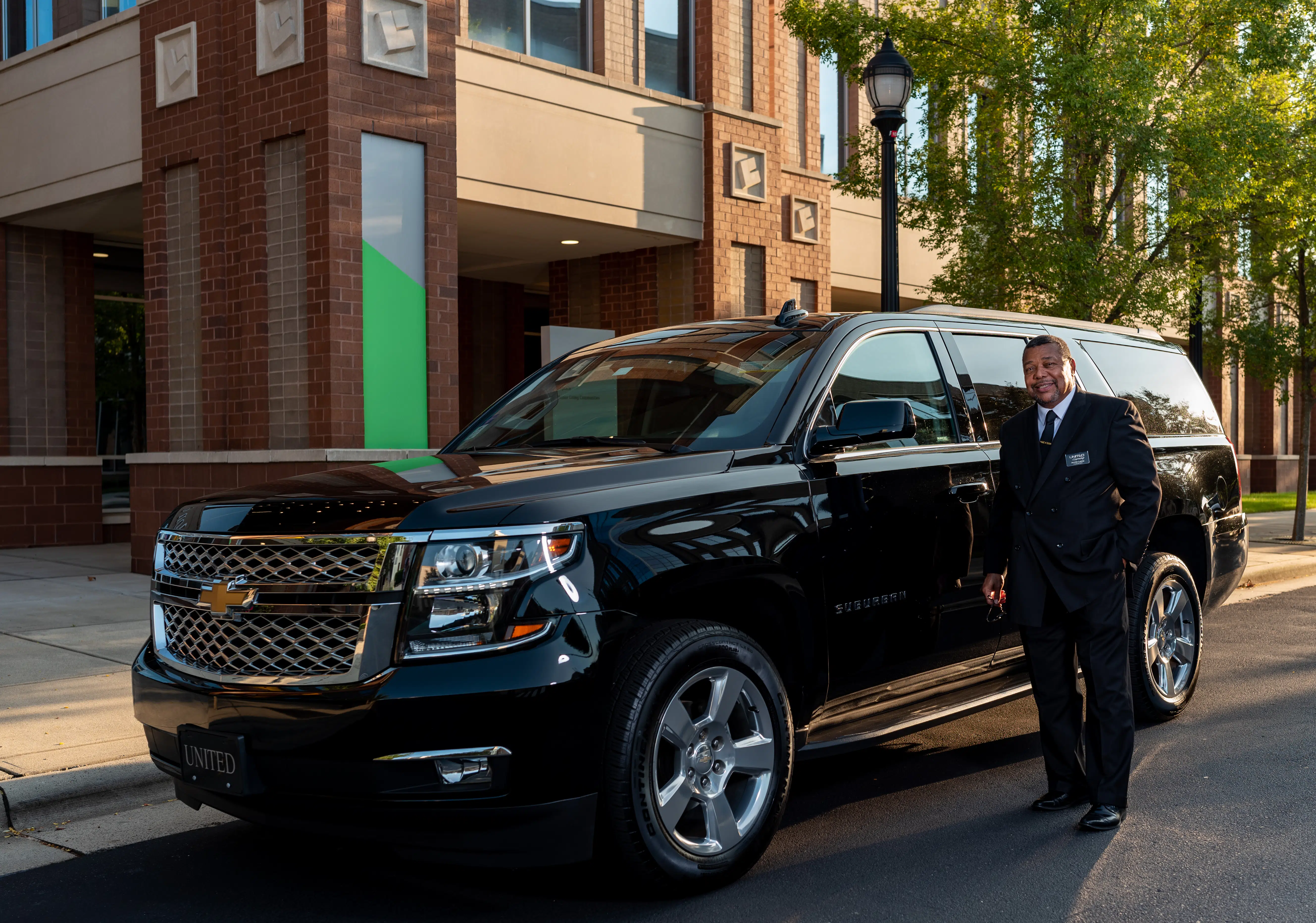 Driver with Chevrolet Suburban for limo in Charlotte