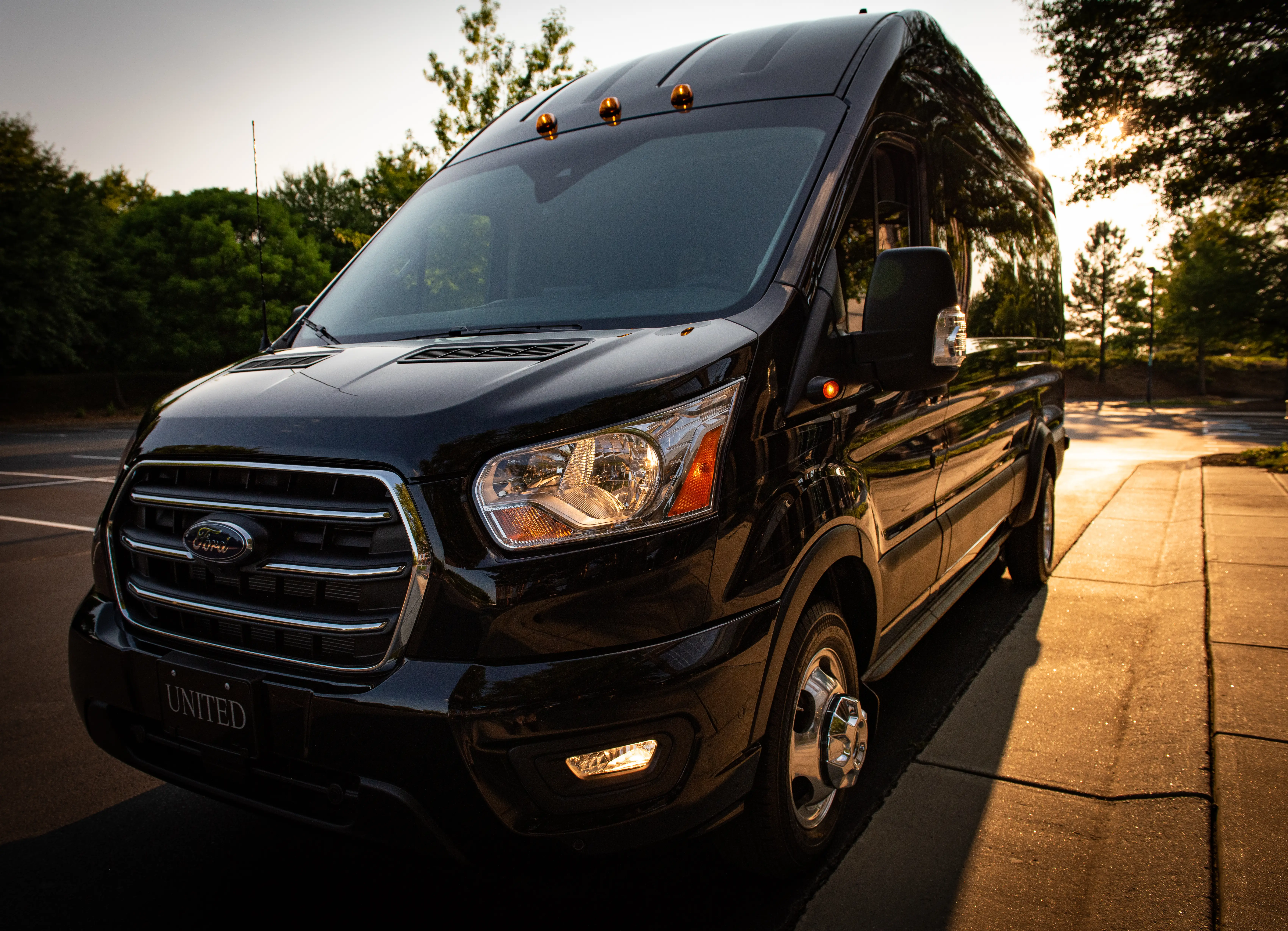 Charlotte Black Ford Transit Passenger Van